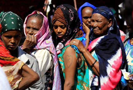 Ethiopian refugees who fled Tigray region, queue to receives treatment within the Fashaga camp on the Sudan-Ethiopia border, in Kassala state, Sudan December 14, 2020. Photo by Mohamed Nureldin Abdallah/Reuters