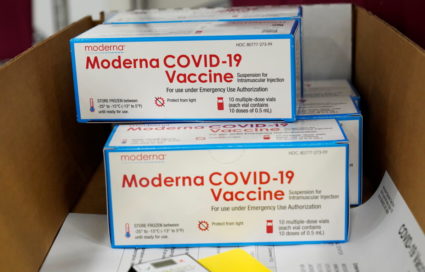 Boxes containing the Moderna COVID-19 vaccine are prepared to be shipped at the McKesson distribution center in Olive Branch, Mississippi, U.S. December 20, 2020. Photo by Paul Sancya/Reuters.