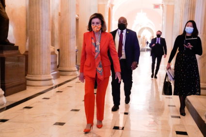 U.S. House Speaker Nancy Pelosi (D-CA) walks through the U.S. Capitol in Washington, U.S., December 17, 2020. REUTERS/Erin Scott