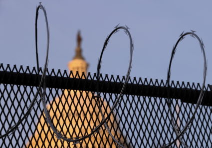 Newly-installed razor wire tops the unscalable fence surrounding the U.S. Capitol in the wake of the January 6th riot and ahead of the upcoming inauguration in Washington, U.S. January 14, 2021. Photo by Jonathan Ernst/REUTERS
