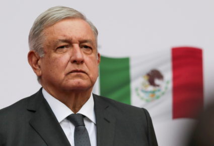 Mexico's President Andres Manuel Lopez Obrador listens to the national anthem as he arrives to address the nation on his second anniversary as President of Mexico, at the National Palace in Mexico City, Mexico, December 1, 2020. Photo by Henry Romero/REUTERS