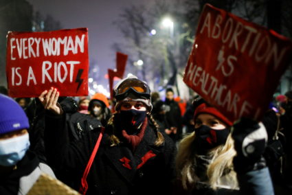 A demonstrator holds a placard during a protest against the verdict restricting abortion rights in Warsaw, Poland, January 28, 2021. Photo by Reuters/Kacper Pempel