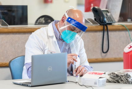 U.S. vaccine rollout remains sluggish, as new coronavirus strain spreads