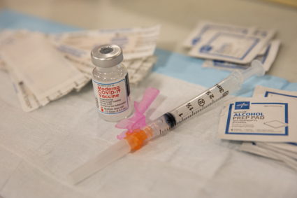 A vial of the Moderna Covid-19 vaccine at Queens Police Academy in the Queens borough of New York, U.S., January 11, 2021. Photo by Jeenah Moon/Pool via REUTERS