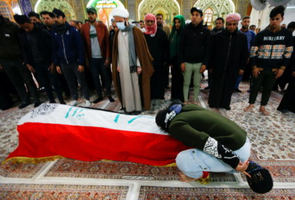 News Wrap: Two suicide bombings kill at least 32 people in Iraq