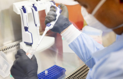 SAN FRANCISCO, CA - JAN. 5: UCSF-Abbott Viral Diagnostics and Discovery Center lab director Dr. Charles Chiu demonstrates the process of extracting samples of COVID-19 for sequencing while working in his lab in San Francisco, Calif. Tuesday, January 5, 2021. Public health experts are increasingly concerned about the impact of highly contagious coronavirus variants. UCSF is running tests on the strains of the virus circulating in California to help identify new strains. (Jessica Christian/The San Francisco Chronicle via Getty Images)