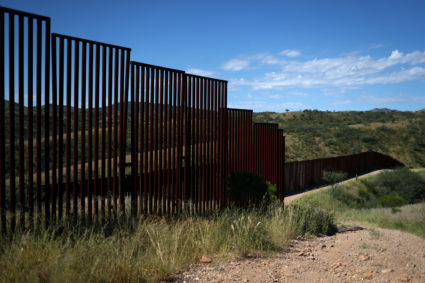 Different generations of the U.S. border wall with Mexico are seen from the United States in Nogales, Arizona, September 13, 2018. Photo by Adrees Latif/REUTERS