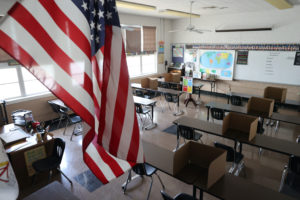 Social distancing dividers for students are seen in a classroom at St. Benedict School, amid the outbreak of the coronavirus disease (COVID-19), in Montebello, near Los Angeles, California, U.S., July 14, 2020. REUTERS/Lucy Nicholson