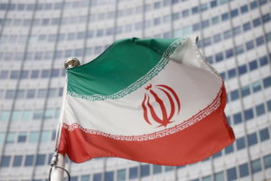 The Iranian flag waves in front of the International Atomic Energy Agency (IAEA) headquarters, before the beginning of a board of governors meeting, in Vienna, Austria, March 1, 2021. Photo by Reuters/Lisi Niesner