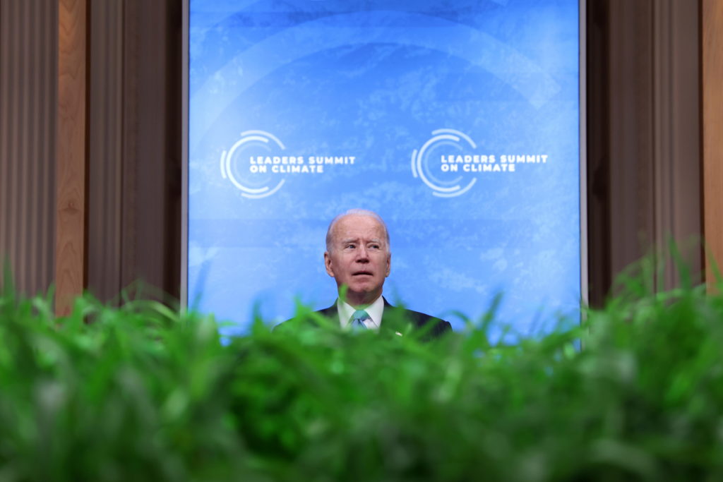 U.S. President Joe Biden looks on following his remarks in a virtual Climate Summit with world leaders in the East Room at...