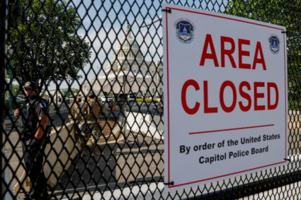 U.S. Capitol Police and National Guard soldiers operate a checkpoint at the U.S. Capitol, in advance of U.S. President Joe Biden's first speech to a joint session of Congress in Washington, U.S., April 28, 2021. Photo by Jonathan Ernst/REUTERS