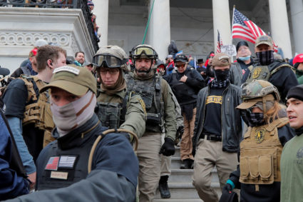 Insurrectionists march down the east front steps of the U.S. Capitol on Jan. 6, 2021. Photo by Jim Bourg/REUTERS