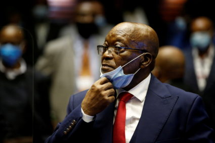 FILE PHOTO: Former South African President Jacob Zuma stands in the dock after recess in his corruption trial in Pietermar...