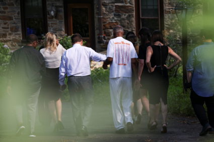 Bill Cosby walks to his house after Pennsylvania's highest court overturned his sexual assault conviction and ordered him ...