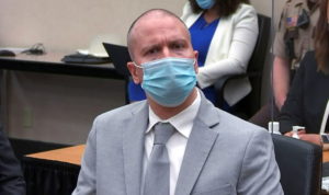 Derek Chauvin listens to a Minnesota judge hand down his sentence