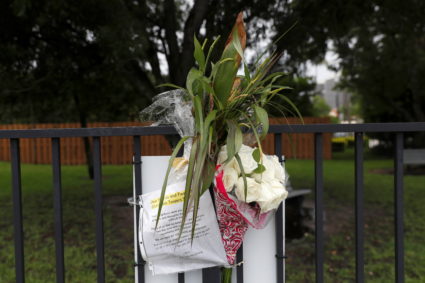 A makeshift memorial for the victims of the Surfside's Champlain Towers South condominium collapse sits in a park nearby i...