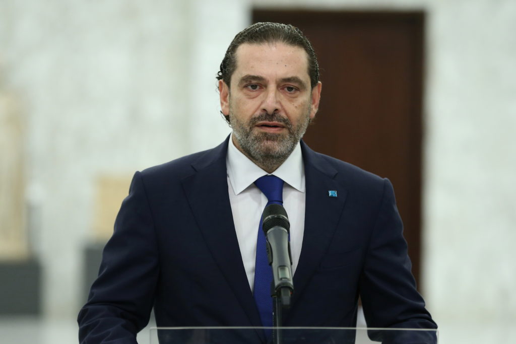 Lebanese Prime Minister-Designate Saad al-Hariri speaks as he abandons cabinet formation, at the presidential palace in Ba...