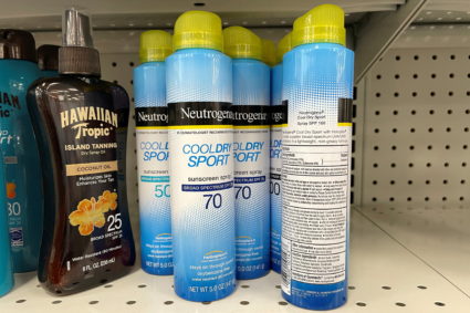 FILE PHOTO: Sunscreens being recalled by Johnson &amp; Johnson sit on a store shelf in Gloucester
