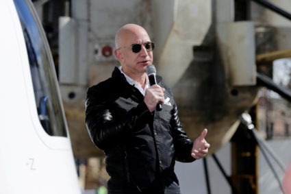 FILE PHOTO: Amazon and Blue Origin founder Jeff Bezos addresses the media about the New Shepard rocket booster and Crew Ca...