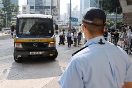 A prison van carrying Tong Ying-kit, the first person charged under the new national security law, arrives at High Court f...