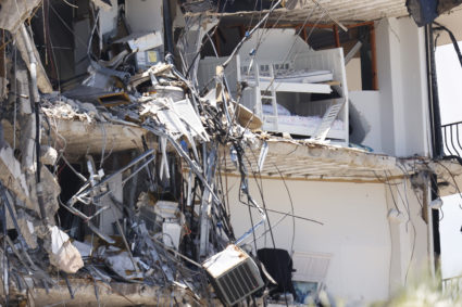 With storm looming, demolition of collapsed condo to start