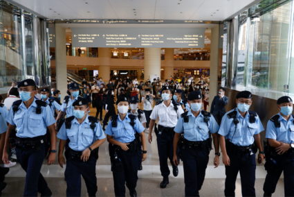 Hong Kong residents worry vague new immigration law could let China ban them from leaving