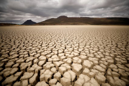 Clouds gather but produce no rain as cracks are seen in the dried up municipal dam in drought-stricken Graaff-Reinet, South Africa, November 14, 2019. Photo by Mike Hutchings/REUTERS