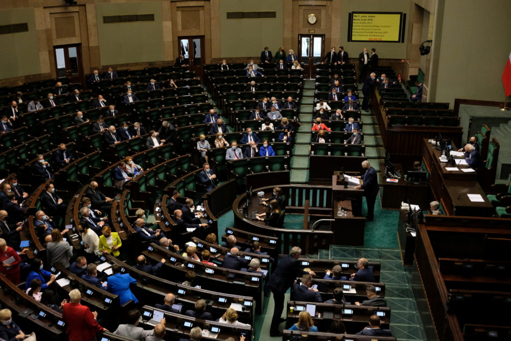 Lawmakers attend a session of the parliamentary commission on an amendment to the Broadcasting Act, in Warsaw