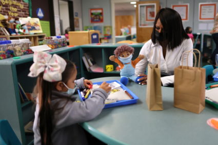 Teacher Vernida Watson talks to student Adalyn on the first day back at school for LAUSD students following the COVID-19 c...