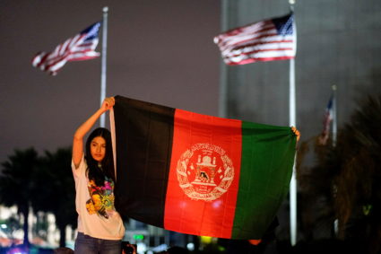 People attend a vigil for Afghanistan in Los Angeles