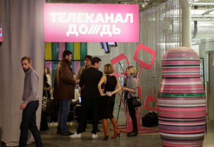 FILE PHOTO: Journalists chat in the offices of independent Russian news channel Dozhd (TV Rain) after a news conference in...