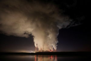 FILE PHOTO: Smoke and steam billows from Belchatow Power Station, Europe's largest coal-fired power plant operated by PGE ...