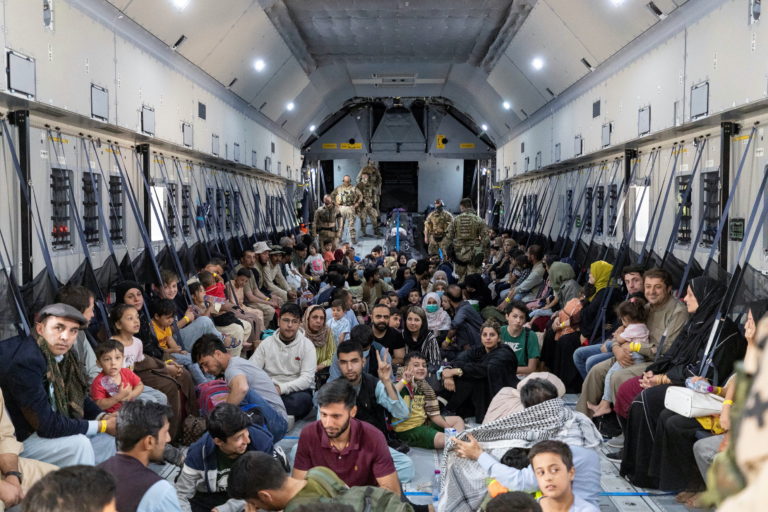Evacuees from Afghanistan inside an Airbus A400 transport aircraft of the German Air Force Luftwaffe in Tashkent