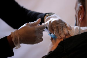 Commuter receives free vaccination for the coronavirus disease (COVID-19) at subway station in Brooklyn borough of New Yor...