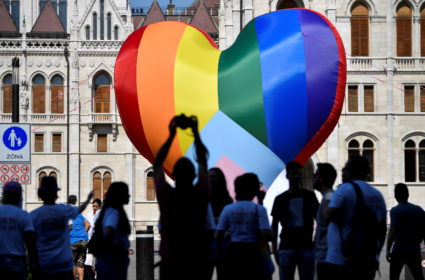 FILE PHOTO: NGOs put up a huge rainbow balloon at Hungary's parliament protesting against anti-LGBT law in Budapest