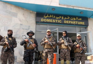 Taliban forces stand guard a day after the U.S. troops withdrawal from Hamid Karzai International Airport in Kabul
