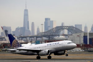 A United Airlines passenger jet takes off with New York City as a backdrop, at Newark Liberty International Airport, New Jersey, U.S. December 6, 2019. Photo by Chris Helgren/REUTERS