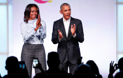 Former U.S. President Barack Obama and former first lady Michelle Obama arrive for the Obama Foundation Summit in Chicago