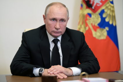 Russian President Vladimir Putin attends a meeting with head of the Central Election Commission Ella Pamfilova, via a vide...