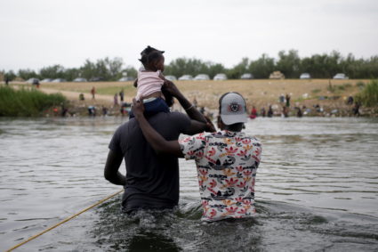 Migrants seeking refuge in the U.S. cross Rio Grande river, in Ciudad Acuna