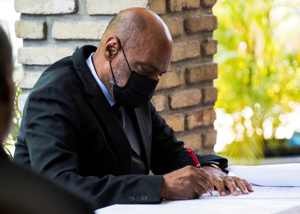 FILE PHOTO: Prime Minister Ariel Henry attends the signing ceremony of the "Political Agreement for a peaceful and effecti...