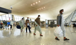 Afghan refugees arrive at Dulles Airport in Virginia