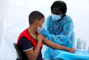 Coronavirus disease (COVID-19) vaccination event outside the Bronx Writing Academy school in New York City