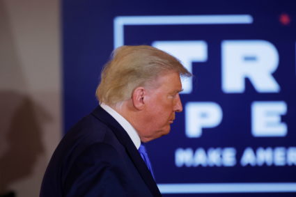 U.S. President Donald Trump leaves after reacting to early results from the 2020 U.S. presidential election in the East Room of the White House in Washington, U.S., November 4, 2020. Photo by Carlos Barria/REUTERS