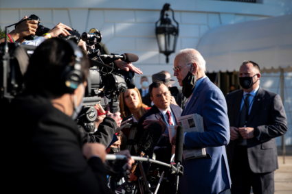U.S. President Joe Biden speaks to reporters before departing for a trip to Wilmington, Delaware