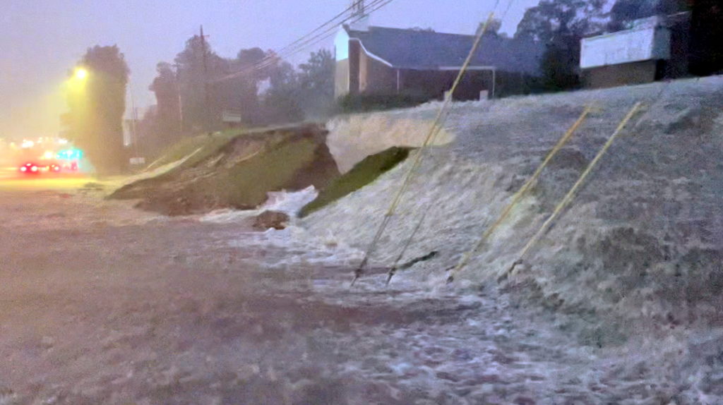 A flooded street is seen during heavy rains in Vestavia