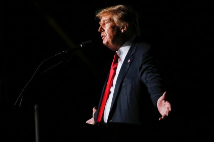 Former U.S. President Donald Trump reacts during his speech during a rally at the Iowa States Fairgrounds in Des Moines, Iowa, U.S., October 9, 2021. Photo by Rachel Mummey/REUTERS