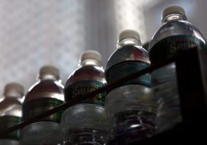 Bottled water are arranged on a cart in New York