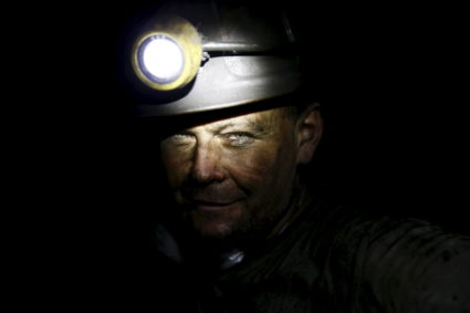 Piotr Dytko, 42, a miner who has has worked for 24 years in mines, looks on as he works about 500 meters underground at th...