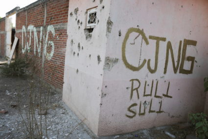 A bullet-riddled facade with the acronym of the Jalisco New Generation Cartel (CJNG) in Michoacan state, Mexico April 23, 2021. Photo by Alan Ortega/REUTERS